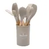Juego de utensilios de cocina de silicona de grado alimenticio de 12 piezas resistente a altas temperaturas con mango de madera y cilindro de almacenamiento ventas directas de fábrica de herramientas de cocina transfronterizas