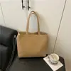 Nueva bolsa de mano grande para commuters transfronterizos para mujer, bolso de hombro casual de cuero suave, bolso simple estilo coreano para mamá