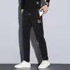 Pantalones casuales de hombre de moda china, nuevos para primavera y verano 2023, pantalones largos elásticos de cintura, bordados, versátiles, para hombre