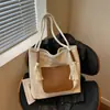 Bolsa de lona de pana estilo perezoso para mujer, nicho, diseño de borla de cuerda gruesa, de un solo hombro/de mano, gran capacidad, bolsa para clase de estudiante