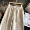 Pantalones milagrosos para adelgazar lana de ácido acético franela otoño e invierno nuevo estilo silueta engrosada cálido adelgazante corte tridimensional hilo tirado forma de capullo pantalones banana mujer