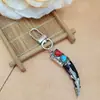 Nova chaveiro criativo europeu e americano transfronteiriço com pingente de óleo, chaveiro de dente de lobo, pingente de bolsa, presente criativo de Halloween
