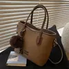 Bolsa de Hombro de Moda Versátil Nueva Primavera 2026 Casual de Gama Alta para Viajar Lujo Ligero Bolso Cubo de Gran Capacidad