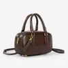 Elegante y minimalista bolsa Boston para mujer, diseño nuevo, con un toque vintage de alta gama, adecuada para ir al trabajo, se puede llevar como bolso de mano, bolso de hombro o bolso cruzado