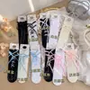 Medias de Malla de Verano Estilo Ins Chica Dulce Pura Blanco Leche Calcetines para Pantorrilla con Encaje Hueco y Moño