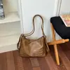 Bolso Retro Maillard para Viajero Mujer 2026 Nuevo Otoño Sensación de Alta Gama Mochila Gran Capacidad Bolso de Hombro Cruzado