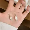 Nuevos aretes colgantes de plata cepillada estilo chino para mujer, de alta gama, únicos y deslumbrantes ganchos para la oreja, adecuados para caras cuadradas y redondas, aretes de moda y elegantes