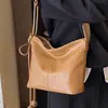 Elegante Bolso para el Trabajo para Mujer, Nuevo Modelo Verano 2026, Moda Retro de Nicho Exquisito Bolso Cruzado de Hombro Único Tipo Cubo