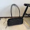 Bolso de axila de nicho estilo coreano para mujer con lazo, simple y moderno, nuevo modelo 2026, estilo dulce y cool, bolso baguette personalizado, bolso de hombro