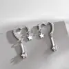 Suministro directo de fábrica de plata esterlina s925, pendientes de estrellas de amor Han Feng, temperamento femenino, pendientes de moda Net Red, pendientes, joyería