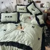 Bordado de toalha em renda e laço estilo francês, conjunto de quatro peças em algodão lavado, com estética feminina, incluindo uma capa de edredom e um conjunto de três peças de lençóis para quartos de dormitórios