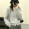 Elegante cardigã de tricô feminino com gola redonda, design em crochê vazado, caimento solto, camada externa de Tencel, nova peça estilosa com botões, leve
