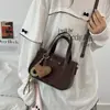 Bolso de mano vintage de ante patchwork para mujer, estilo Maillard, bolso de nicho para el día a día, se puede llevar cruzado, elegante bolso de moda de un solo hombro