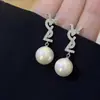 Brincos de Pérola com Design de Nicho da Moda Femininos Elegantes de Celebridade Versáteis Leve Luxo Alto Padrão Outono e Inverno Simples