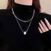 Collar de metal apilado de doble capa para mujer, nuevo, combinable con todo, de nicho, ligero, de lujo, de alta gama, elegante cadena de lana.