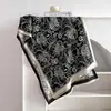 Chal de imitación cachemir de color anacardo con bloques de color estilo ins y estampado floral, bufanda versátil de doble cara nueva, al por mayor