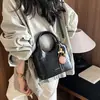 Bolsa Pequeña Super Caliente para el Trayecto Diario para Mujer 2026 Nuevo Verano Lujo Ligero Bolso Cubo de Hombro Cruzado Bolso de Mano