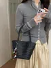 Bolsa tote tipo cubo elegante de gran capacidad transfronteriza, nueva colección otoño 2026, bolso de hombro/bolso cruzado casual y versátil, juego de dos bolsas