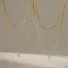 Colar Jieding em Aço Titânio Levemente Luxuoso Pequeno Várias Camadas Empilhável Corrente para Clavícula Outono e Inverno Corrente para Suéter Cruz de Aço Inoxidável Ornamentos Transfronteiriços Mulheres