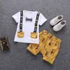 Ropa de verano para bebés y niños, traje de manga corta para bebé niño, traje de dos piezas de comercio exterior, ropa de verano para niños, primera generación de pelo
