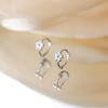 S999 Plata de Ley para Pie Flor Pétalo Hebilla de Oreja Mujer Fresca Pequeña Elegante Nicho Diseño Avanzado Lujo Ligero Pendientes de Gota de Pegamento Venta al por Mayor