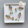 Precio mayorista directo de fábrica pulsera hecha a mano pulsera con colgante diy accesorios pequeños deslizantes colgante de garra de gato lindo Joker
