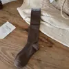 Tacto Súper Suave 2025 Otoño e Invierno Nuevos Calcetines de Lana Cálida de Color Sólido para Mujer Tipo JK Holgados de Tubo Largo Venta al por Mayor