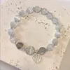 Pulsera Ojo de Gato Blanco Retro Piedra Lunar Gris Natural Pulsera Marca Fu Femenina Mori ins Diseño de Nicho Inmortal
