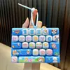Llavero colgante de teclado de 26 teclas, juguete antiestrés para estudiantes, decoración divertida para bolsa, interesante regalo pequeño al por mayor