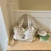 Bolsa tote grande e estilosa 2026 nova bolsa de mão versão coreana bolsa transversal simples bolsa de ombro casual fresca