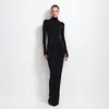 Roupas femininas transfronteiriças europeias e americanas outono 2026 novo macacão de cor sólida com gola alta e saia plissada com fenda terno casual para mulheres
