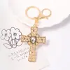 Regalo Pequeño Navideño Llavero de Cristal con Cruz Estilo Ins Decoración Navideña Llavero de Metal con Pedrería Caja