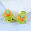 Estilo nuevo de celebridad de internet juego de emparejar de tortuga luminosa de frutas juguete mismo estilo modelo de animal de tortuga simulación