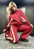 2026 Europea y Americana Transfronterizo Amazon Otoño Comercio Exterior Y2K Rayas Cremallera Top Chaqueta Traje Deportivo Casual para Mujer