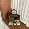 Bolsa pequena quadrada da moda estilo coreano para mulheres, novo modelo outono 2026, bolsa de ombro e transversal casual com textura única e moderna