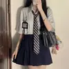 Camisa de Uniforme Jk Rayada Set de Uniforme Original Falda Plisada Estilo Universitario Reductora de Edad Dulce Holgada Adelgazante Camisa para Mujeres