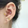 Clavos para Hueso de la Oreja Shi Jiahuazi de 4 mm 30 Colores Opcionales Tapones Espirales de Acero de Titanio para Dormir Sin Quitar Clavos para Hueso de la Oreja con Diamante de Colores