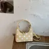 Bolso pequeño súper popular y exquisito para mujer, nueva moda de verano 2026, bolso de hombro y cruzado de alta gama para el trabajo