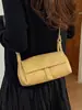 Bolsos populares para mujer de este año 2026 nuevo de moda versión coreana versátil tejido bandolera para axila bolso de mano de alta gama