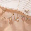 Traje de joyería europeo y americano moda mariposa amor joyería collar pendientes anillo pulsera traje de cuatro piezas en stock
