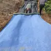 Nuevo Tipo de Esterilla de Cemento Curado con Agua para Protección de Taludes de Estanques de Peces, Renovación de Canales de Ríos, Endurecimiento de Pavimentos y Fabricante de Esterillas de Cemento Compuesto Anti-Filtraciones
