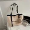 Bolso de Paja Tejida para Vacaciones en la Playa para Mujeres 2025 Nuevo Popular de Gran Capacidad Bolso de Hombro Moderno Bolso Tote de Moda para el Trabajo