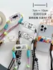 Clip de clip trasero para teléfono móvil de perro jefe de dibujos animados, nueva funda para teléfono móvil con cordón de cuerda, clip creativo para teléfono móvil, clip de cordón para teléfono móvil