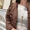Collar con Colgante de Ojo de Tigre Forma de Gota de Agua de Saturno, Cadena de Suéter de Lujo Ligero para Espalda Baja de Emperatriz, Nueva Cadena para Clavícula de Otoño e Invierno
