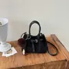 Elegante bolso cubo para mujer, nuevo estilo coreano 2026, bolso de hombro minimalista y moderno, bolso cruzado de nicho para mujer