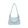Bolsa de axila em formato de estrela estilo coreano para mulheres, novo modelo transfronteiriço, bolsa de ombro simples e versátil, bolsa de mão casual da moda para o dia a dia