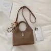 Bolso Elegante Estilo Coreano Bolso Cubo para Mujer 2026 Nuevo Nicho Bolso de Hombro Cruzado de Gama Alta Bolso de Moda para Viajes