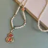 Nova Corrente de Colar com Pingente de Pérolas Estilo Chinês Retrô para Mulheres Corrente de Suéter Cheongsam Saia Rosto de Cavalo Estilo Antigo Estilo Étnico Estilo Nacional Acessórios