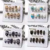 Uñas Acabadas Color Sólido Ojo de Gato Pintadas con Diamantes Hechas a Mano Juego de 10 Piezas Escalera Corta Multicolor Fabricante de Uñas Portátiles Europeas y Americanas