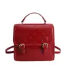 Mochila de alta gama estilo academia con doble hebilla 2026 Nueva moda Bolso de mano versátil Bolso de hombro con relieve para el trabajo